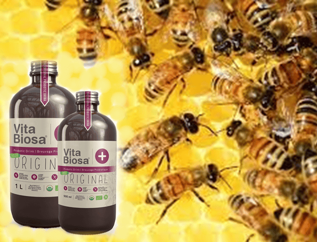 Bottles of Vita Biosa and honey bees